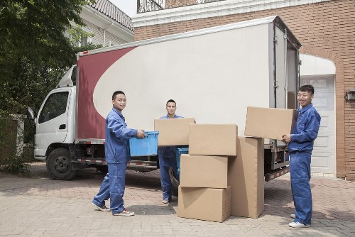 Office removals planning in Holland Park with packed boxes and moving equipment