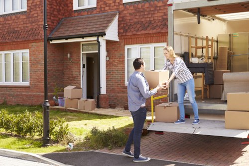 Packing and unpacking service for Holland Park homes with boxes and wrapping materials