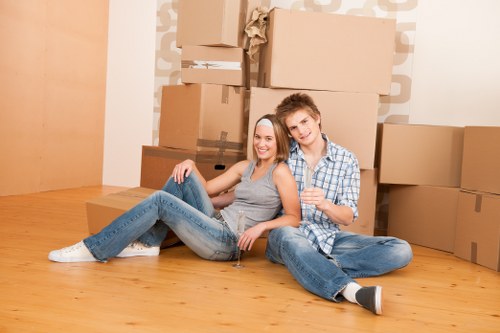 Packing boxes and fragile items for a local removals service