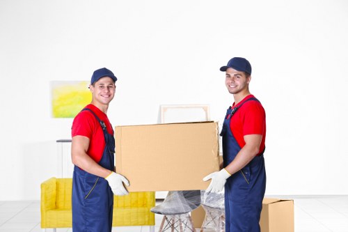 Removals van serving residential streets in Holland Park