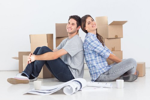 Local movers transporting furniture through West London streets