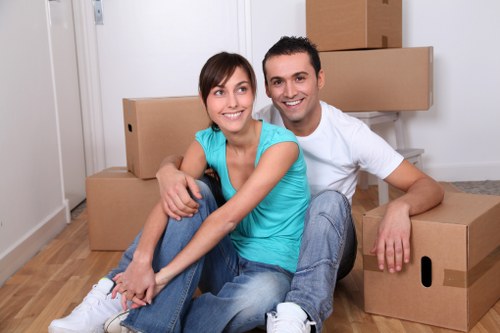 Packed boxes and furniture ready for removals in Holland Park