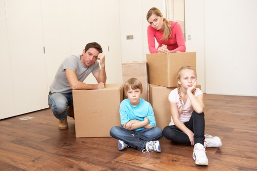 Careful handling of household furniture during a move in Holland Park