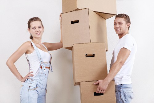 Loading a removal van near a Holland Park property