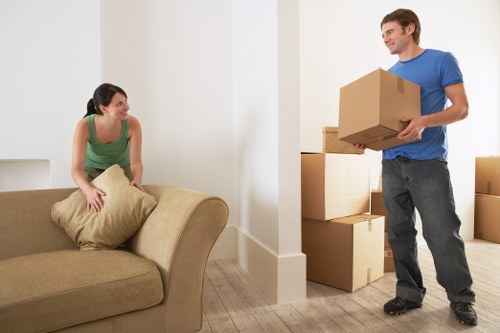 Packed business items ready for transport during a Holland Park relocation