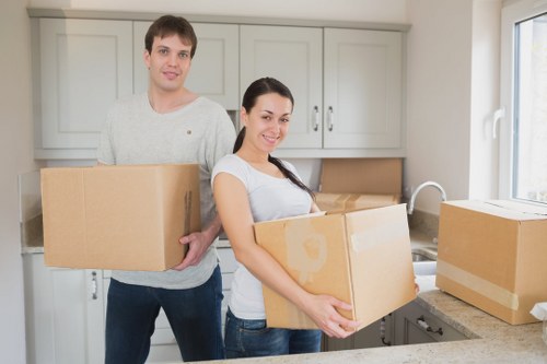 Packed boxes and home-moving supplies ready for a Holland Park relocation